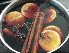 Load image into Gallery viewer, SpiceFix whole round cinnamon sticks being used to make fragrant tea