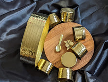 Load image into Gallery viewer, brass coated containers, spoon and masala dabba bottom on display