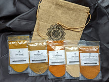 Load image into Gallery viewer, SpiceFix street foods of India masala packs on display. Garam masala, pav bhaji masala, chole masala, chat masala, biryani masala