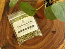 Load image into Gallery viewer, SpiceFix premium Idukki whole green cardamom pods, pack of 1.8 oz on display