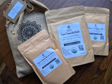 Load image into Gallery viewer, SpiceFix Organic Turmeric Root Powder, Organic Moringa Powder and Organic Ashwagandha Powder displayed next to a beautiful burlap gift bag 
