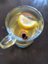 Load image into Gallery viewer, SpiceFix whole round cinnamon sticks being used in a hot cocktail 

