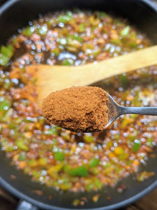 SpiceFix Garam Masala blend being used in creating delicious curry 