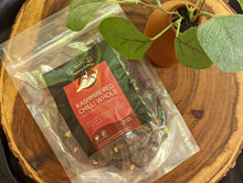Load image into Gallery viewer, SpiceFix Dried Red Kashmiri Whole Chilies pack of 2.65 oz on display
