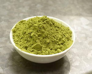 SpiceFix Organic Moringa Powder displayed in a bowl