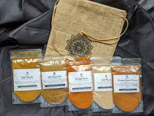 Load image into Gallery viewer, SpiceFix street foods of India masala packs on display. Garam masala, pav bhaji masala, chole masala, chat masala, biryani masala
